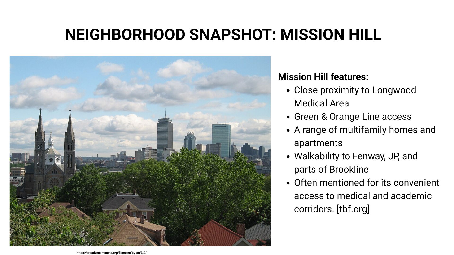Mission Hill neighborhood overlooking Boston skyline with multifamily homes and green spaces.